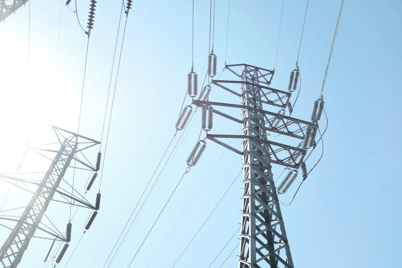 High Voltage Line - Photo by Jonathan Hanna on Unsplash
