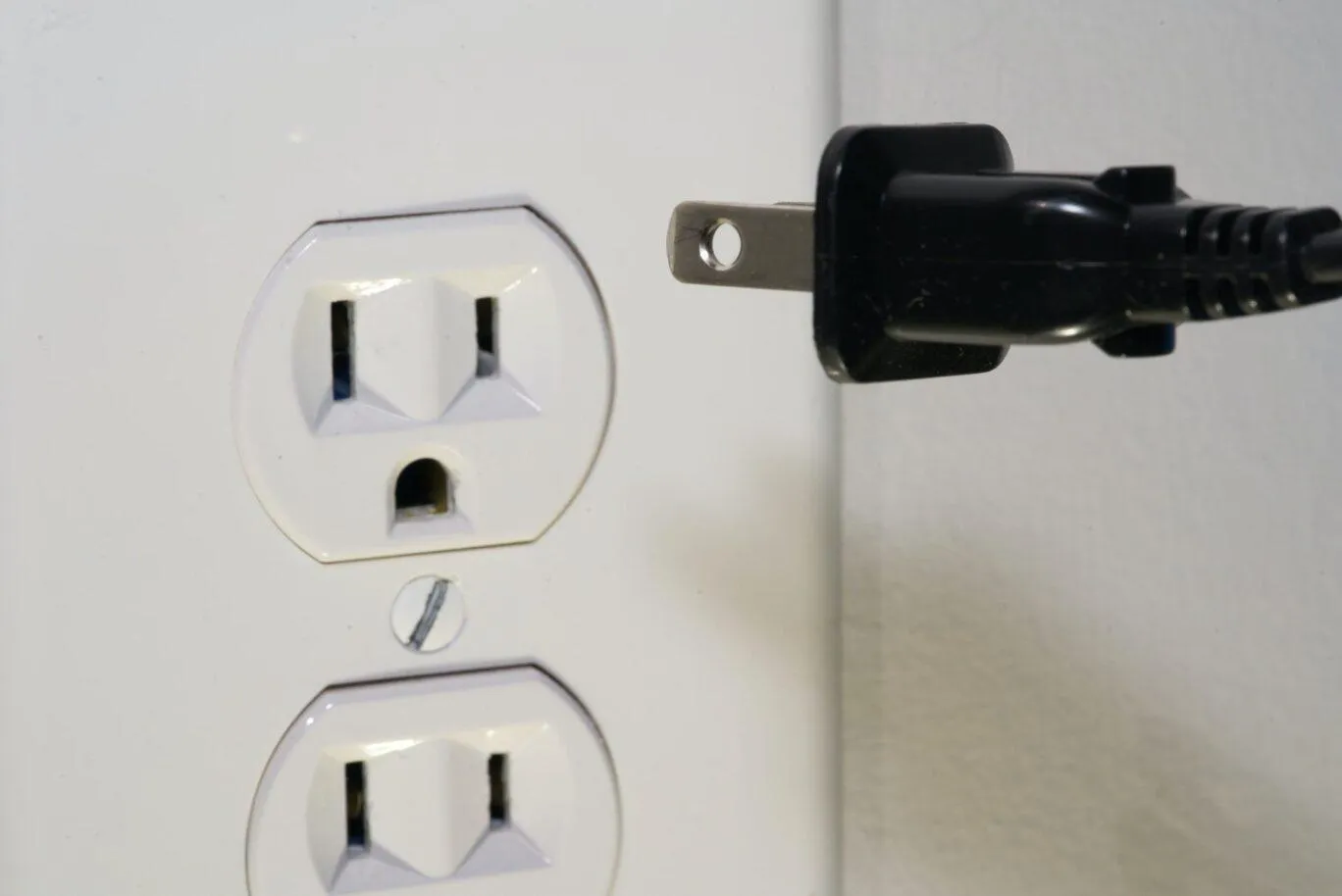 Electrical Outlet and Plug - KrisTech Wire (Photo via Clint Patterson, Unsplash)