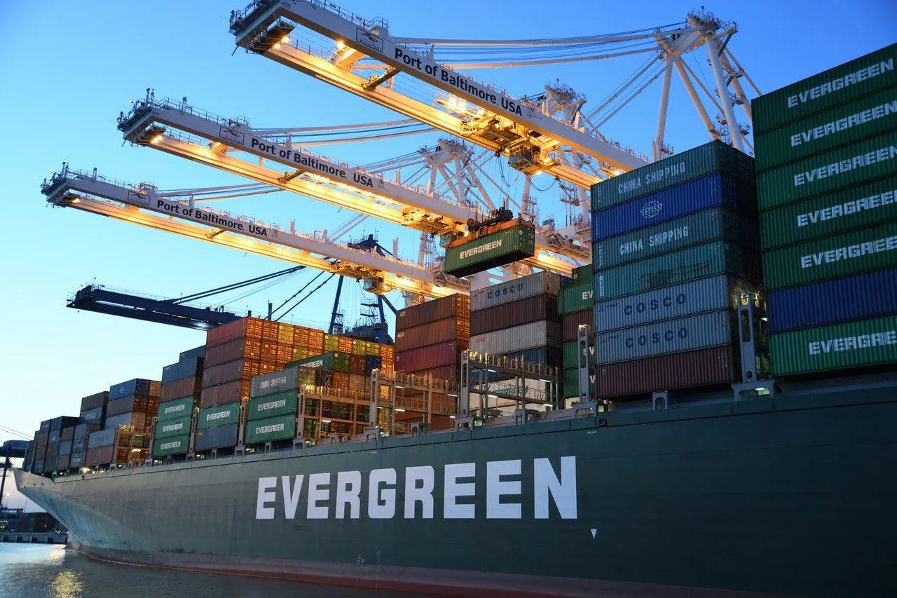 Container ship docked at a port. Photo Credit: David Dibert