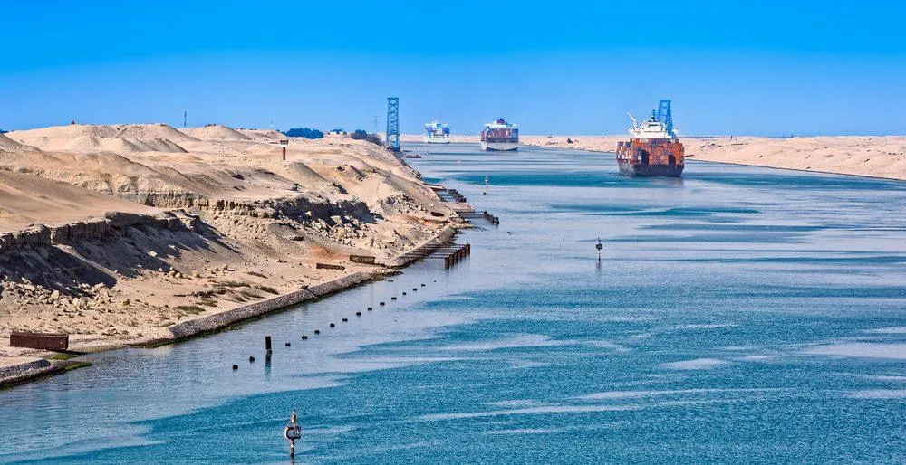 Ships in a convoy passing through the Suez Canal - KrisTech Wire (Photo via Shutterstock)