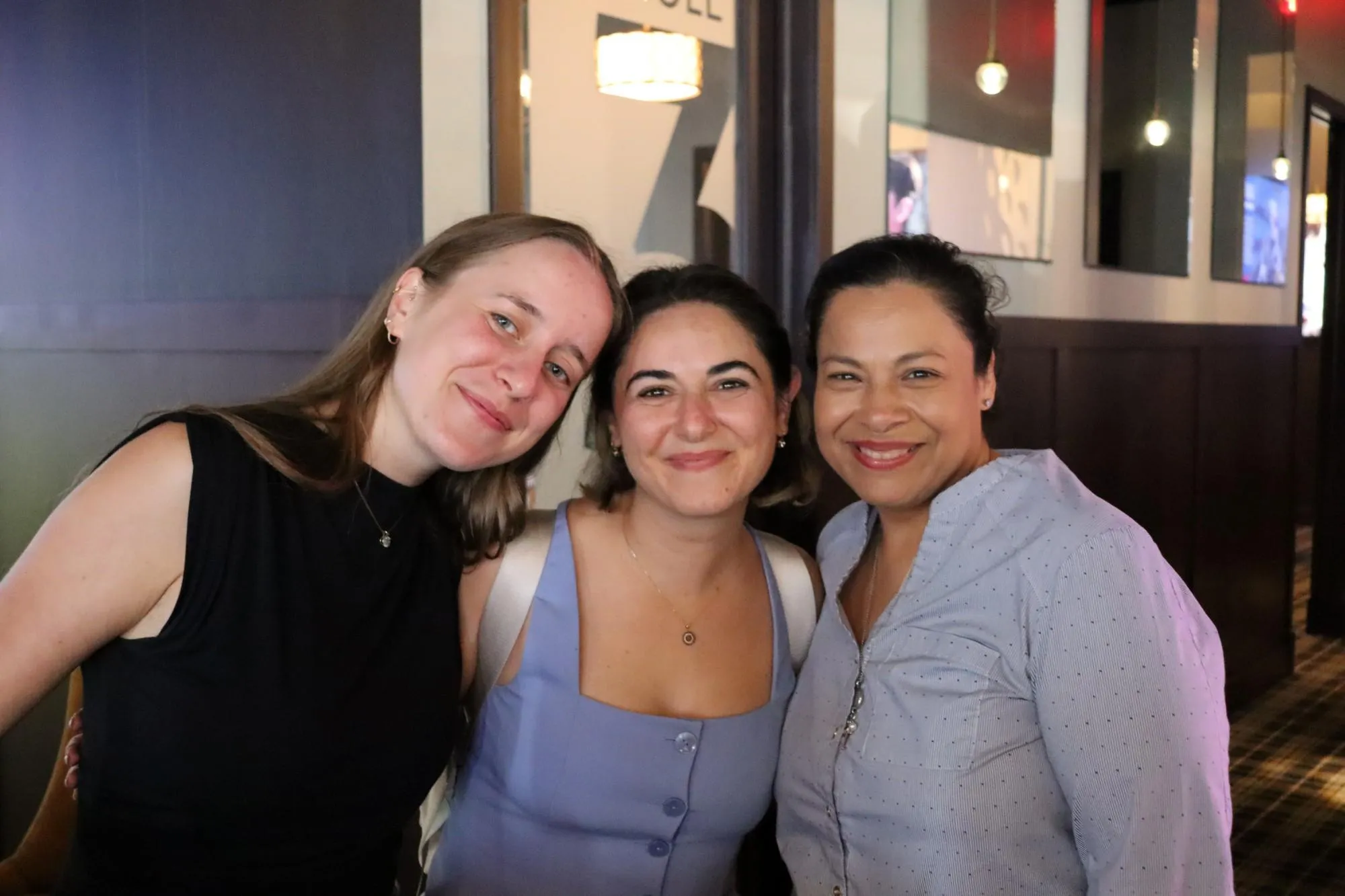 A group of employees pose for a photo during a recent event at the Bunker in New Hartford, NY. Photo by Gino Geruntino.