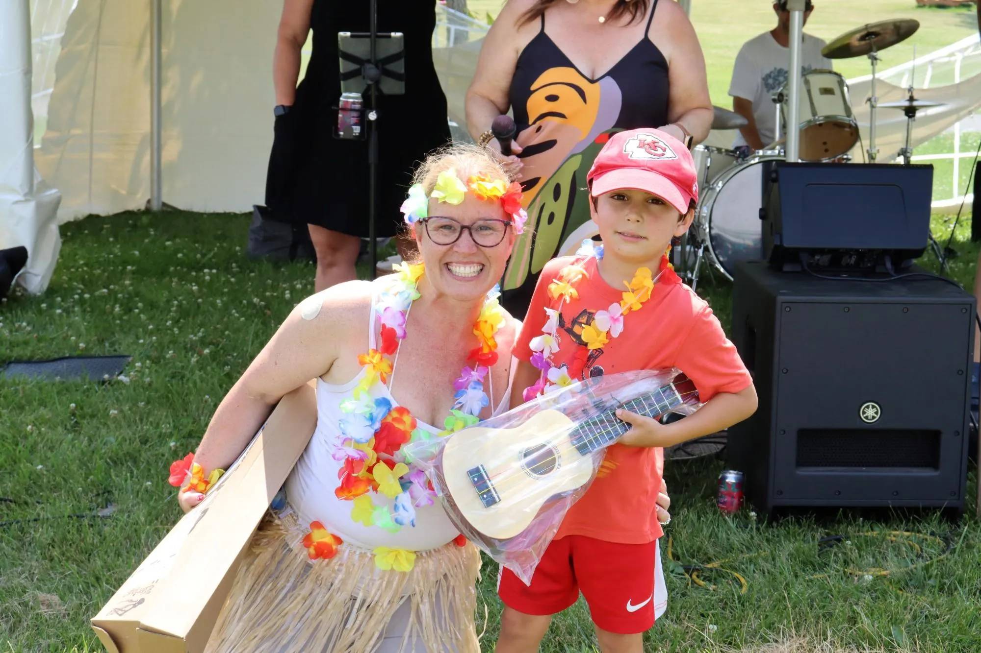 This year's winner of the hula hoop contest won a new ukulele! Photo by Gino Geruntino.