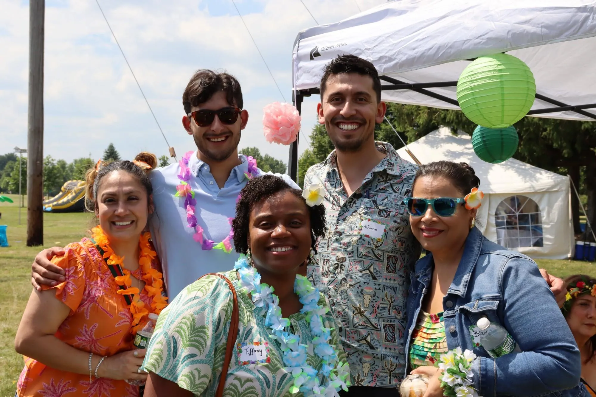 The KrisTech Houston team poses for a photo during the company's summer picnic. Photo by Gino Geruntino.