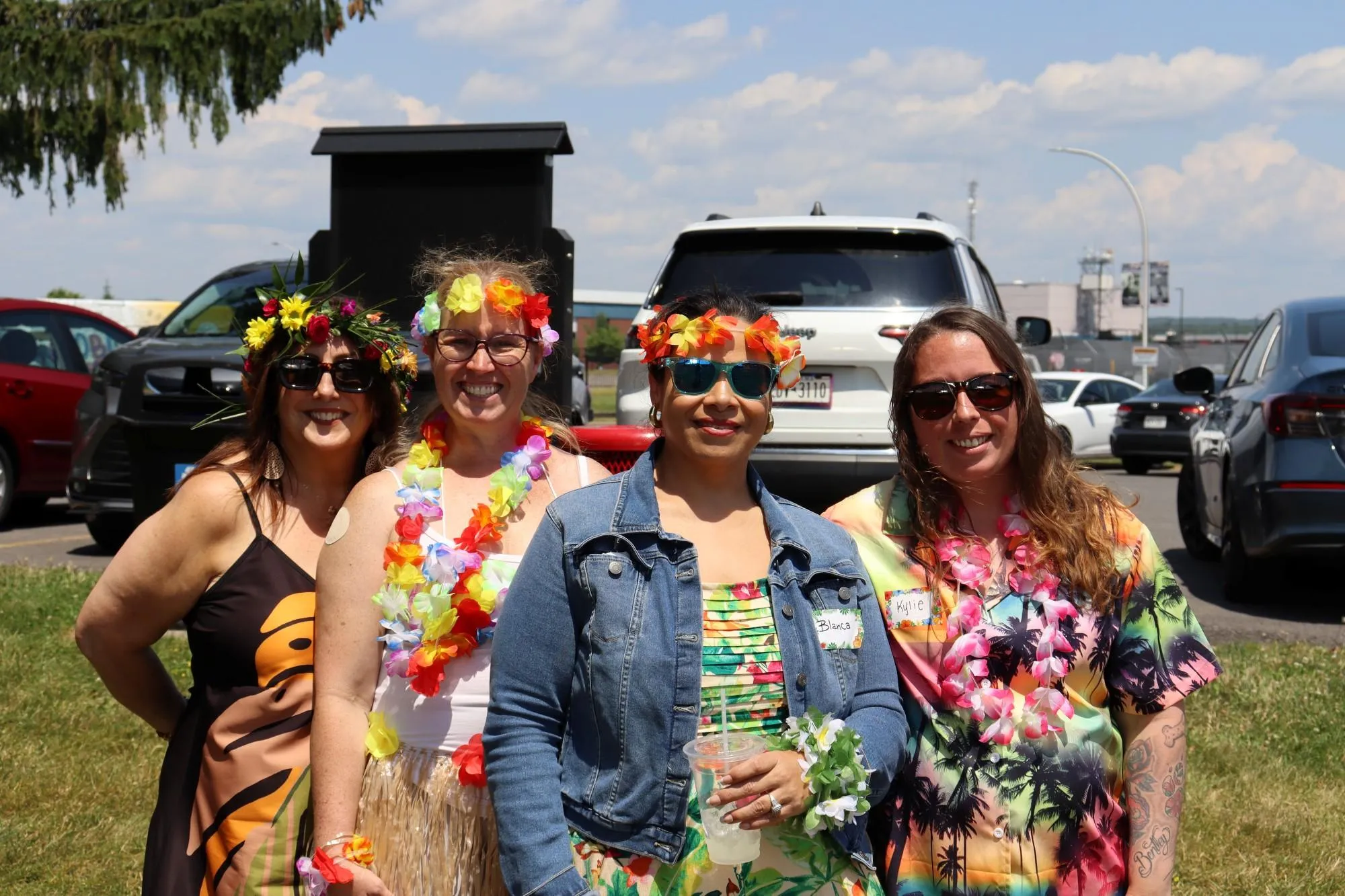 The KrisTech Customer Service team poses for a photo during the company's summer picnic. Photo by Gino Geruntino.