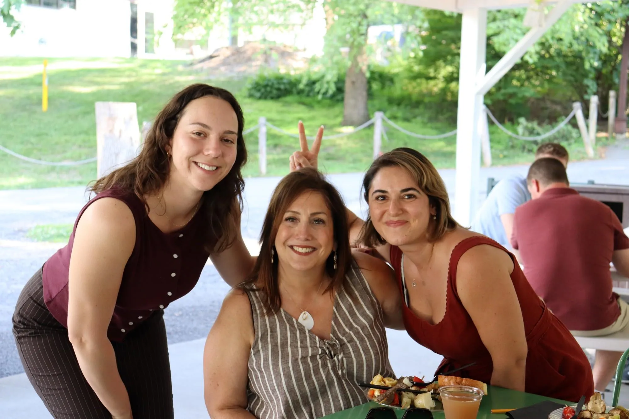 All smiles during an event at the Utica Zoo for KrisTech's summer gathering. Photo by Gino Geruntino.
