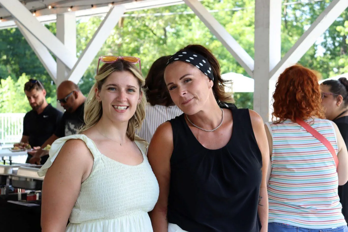 KT employees grab a quick photo together during an event at the Utica Zoo. Photo by Gino Geruntino.