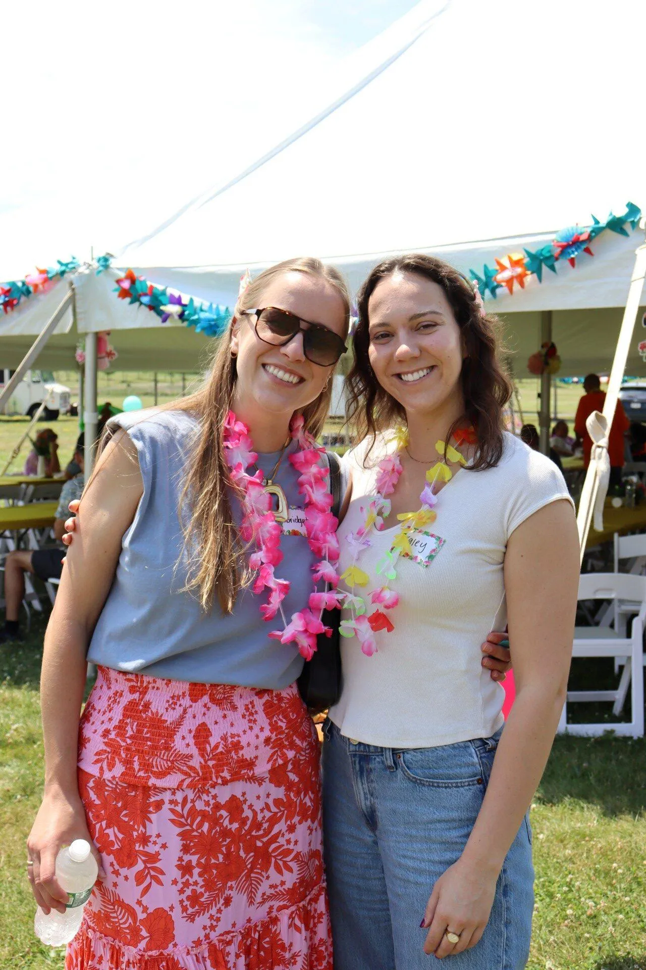 KT employees are all smiles during the KrisTech summer picnic, Photo by Gino Geruntino.