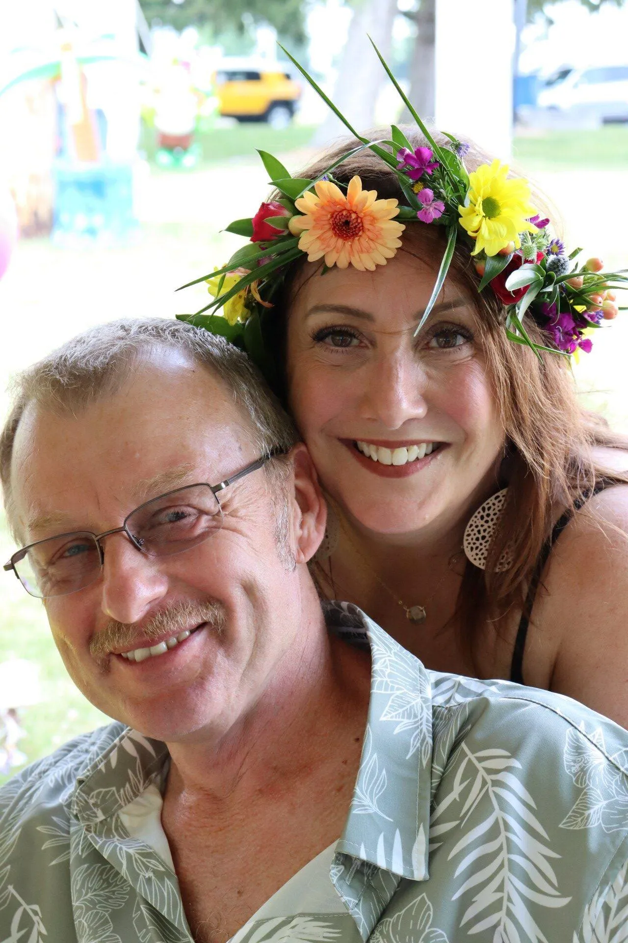 KT Employees share a moment during the KrisTech summer picnic. Photo by Gino Geruntino.