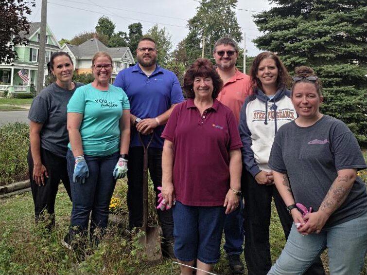 KrisTech employees pose for a photo during a recent volunteer project with Rome Clean and Green.
