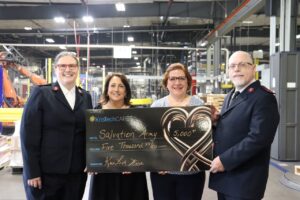 Kris-Tech donated $5,000, food, clothing, and other items to the Salvation Army of Rome.